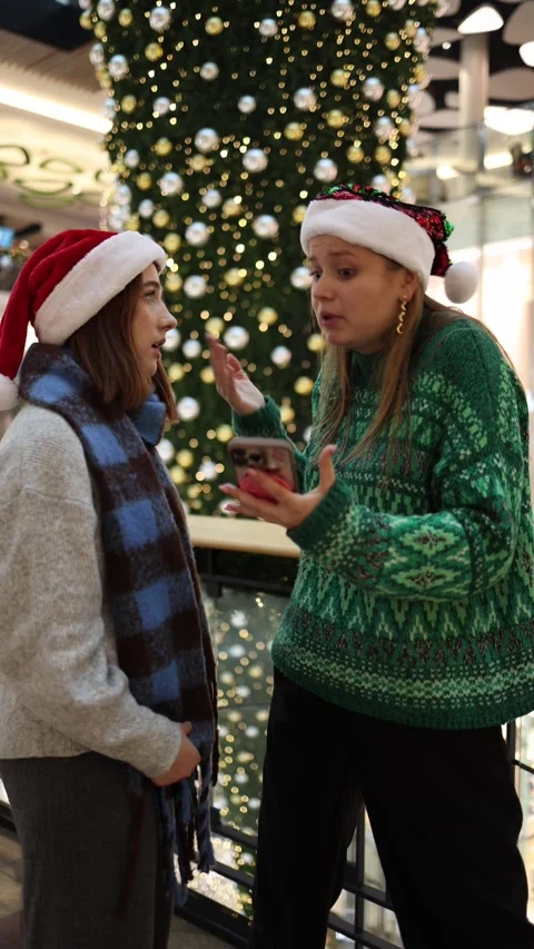 Two women confused while planning christmas and new year Stock Footage 324814758