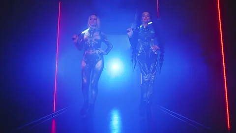 Two women cyborg creative robot costume metal body creative makeup, cyberpunk Stock Footage 311817419