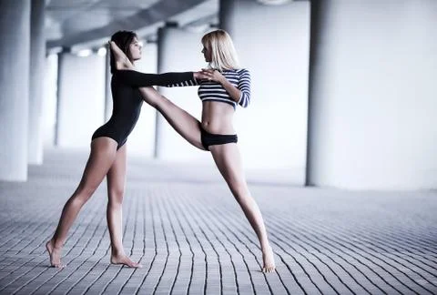 Two women dancing Stock Photos