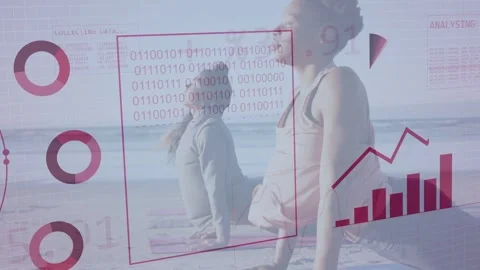 Two women doing backbend on beach, magenta globe appearing and driving data Stock Footage 333610181