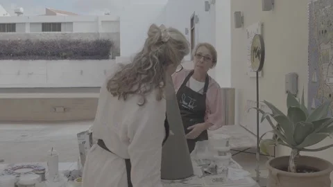 Two women engaged in artistic work in Paphos, Cyprus Vidéo 344056698