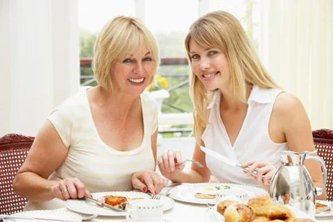 Two Women Enjoying Hotel Breakfast Stock Photos