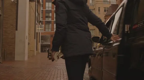 Two Women Exit Taxi Stock Footage 59381672