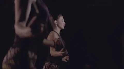 Two women jumping with ropes synchronously in studio. Stock-Footage 76909925