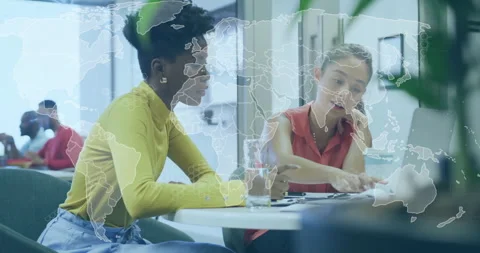 Two women leaning over documents, pointing at papers in business with floating Stock Footage 308656385