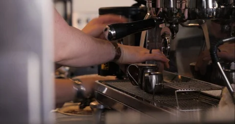 Two women making coffee quickly in a busy cafe in Canada Video stock 113323252