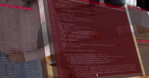 Two women mounting bracket for smart home device, code overlay showing setup and Stock Footage 320483934