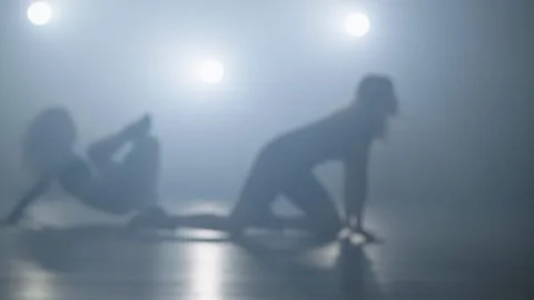 Two women perform an improvisational dance in high heels. Stock Footage 241795497