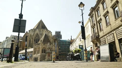 Two women sort out their shopping bags in Hastings town centre 6K Stock Footage 330037359