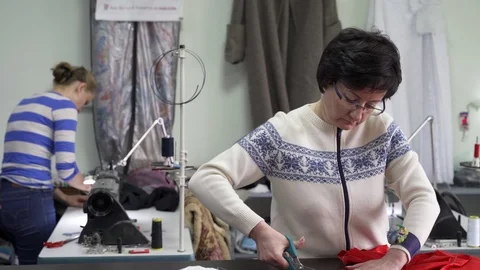 Two women tailors in the Studio working together Stock Footage 126938710