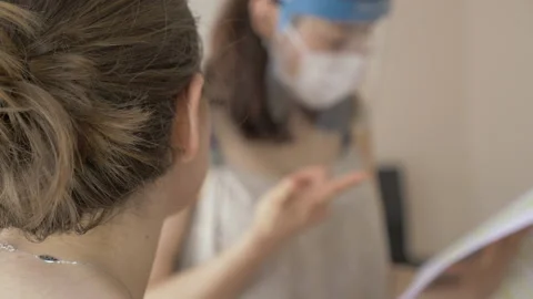 Two women is talking about a project Stock Footage 135235527