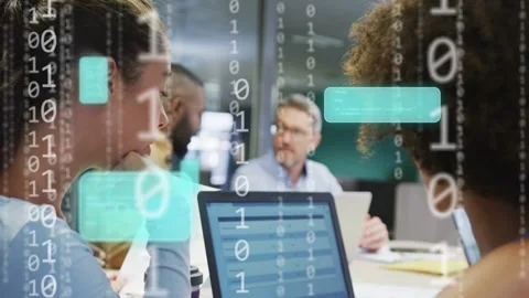 Two women tapping laptop causing binary digits and teal message boxes Stock Footage 333998739