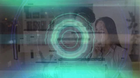 Two women tapping tablet, testing tech while holographic rings shifting, Stock Footage 333019396