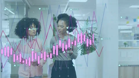 Two women walking corridor, tapping tablet and reviewing finance data, Stock Footage 335281918