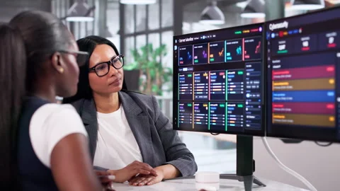 Two Women Work Together Using Cybersecurity Software Vídeo Stock 333402351