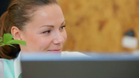 Two women working at a computer Stock Footage 38551650