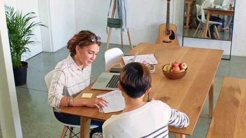 Two women working together having a meeting Stock Footage 79462247