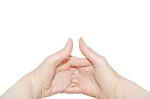 Two women's hands of the same person, interlock fingers on white background Stock Photos