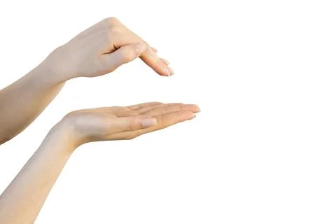 Two women's hands on a white background one above the other, showing a house or Stock Photos