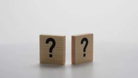 Two wooden blocks with a question mark on them Stock Footage 278166049