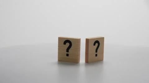 Two wooden blocks with a question mark on them Stock Footage 278348844