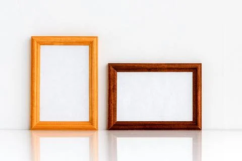 Two wooden frames with a white insert inside for text or drawing. Photo frame Stock Photos