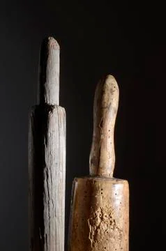 Two wooden phallic object Stock Photos
