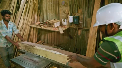 Two woodworkers stands working in workshop Stock Footage 297598560