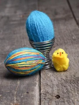 Two woolen Easter eggs Stock Photos
