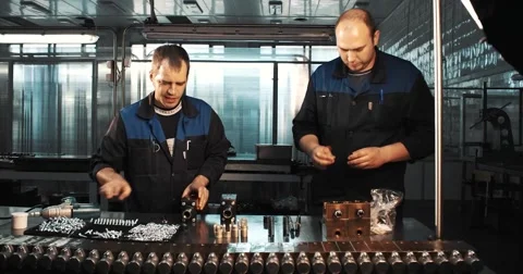 Two worker in factory on the machine Stock Footage 51739980