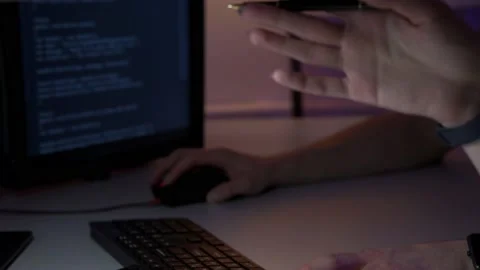 Two worker of IT sphere are discussing new project sitting in front of computer Stock Footage 152720900