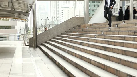 Two workers are in a hurry to walk because of late Stock Footage 85544852