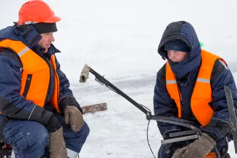 Two workers at the assembly site of the ice town 写真素材