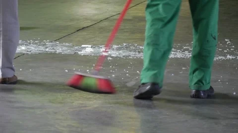 Two Workers, Cleaners, Green Uniform, Legs Closeup, Are Sweeping The Floor, Stock Footage 53008279