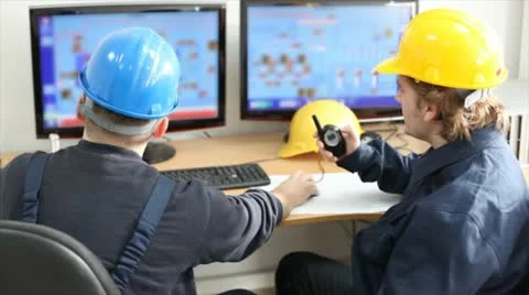 Two Workers in a Control room Stock Footage 24651826
