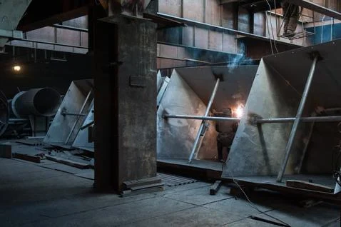 Two workers doing a industrial welding Stock Photos
