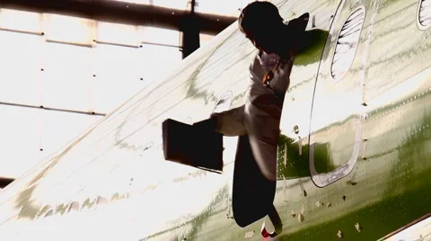 Two workers go through the door Stock Footage 997471