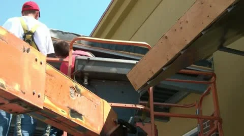 Two Workers on Lift Construct Video stock 12615482