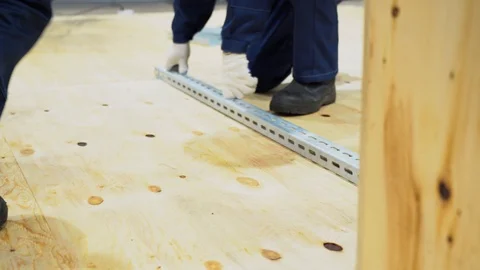 Two workers men wear white gloves draw straight line, marking close up view Stock Footage 126356249