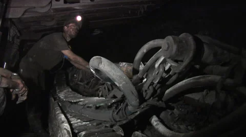Two Workers in The Mine Dirty Men Workers in Safety Helmets and Lamps on the Stock Footage 53506320