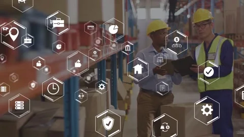 Two workers pointing at tablet, initiating inventory check as hex icons Stock Footage 334884166