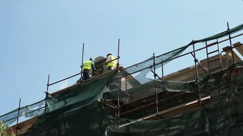 Two Workers on Scaffolding Stock Footage 11055915