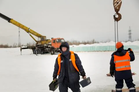 Two workers at the site of the ice camp 스톡 사진