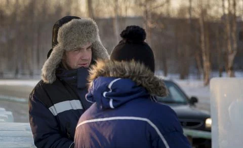 Two workers at the site of the ice camp 写真素材