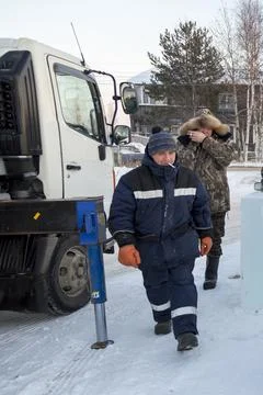 Two workers at the site of the ice camp 스톡 사진