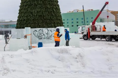 Two workers talk on the assembly site 写真素材