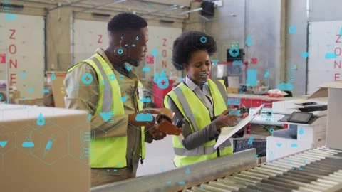 Two workers verifying orders at packing line, using scanner, initiating blue Stock Footage 333132817