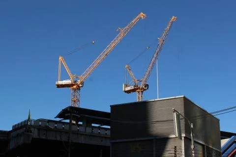 Two working cranes Stock Photos