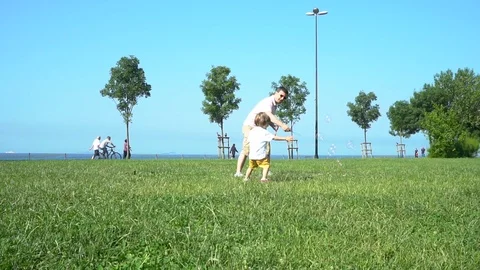 Two year eslking and checking around in a park Stock Footage 109216887