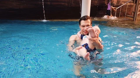  two-year-old blond boy with his father with great joy Stock Footage 104952931